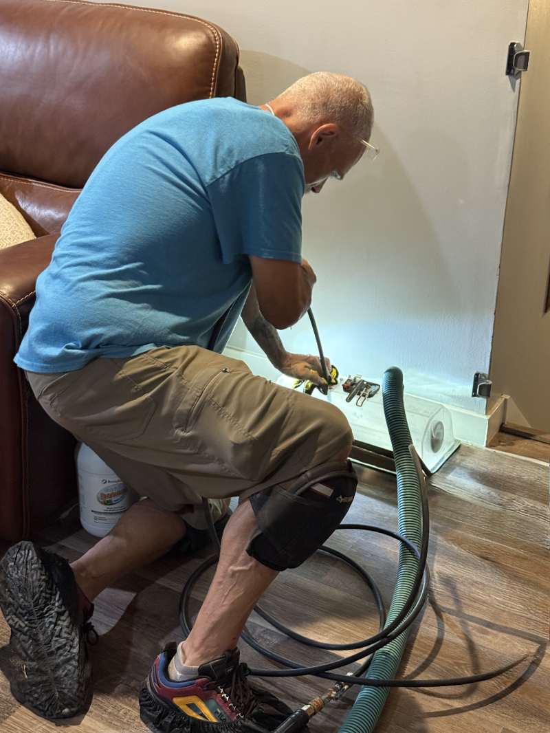 Tim cleaning out a air duct